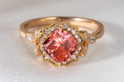 Gold engagement ring with ruby